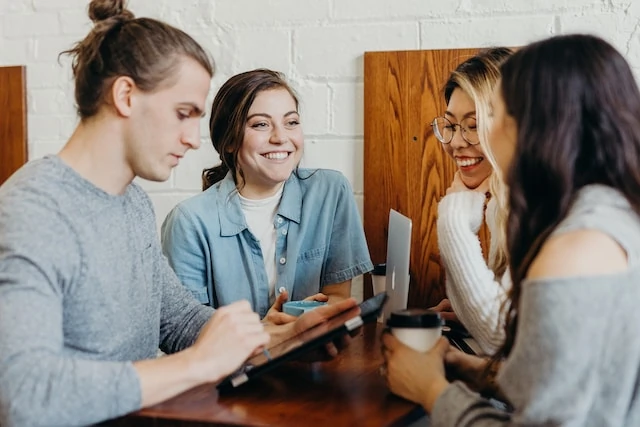 Authentic group of young people talking to each other