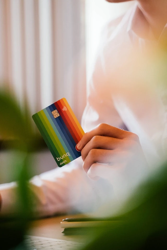 Hand holding a credit card